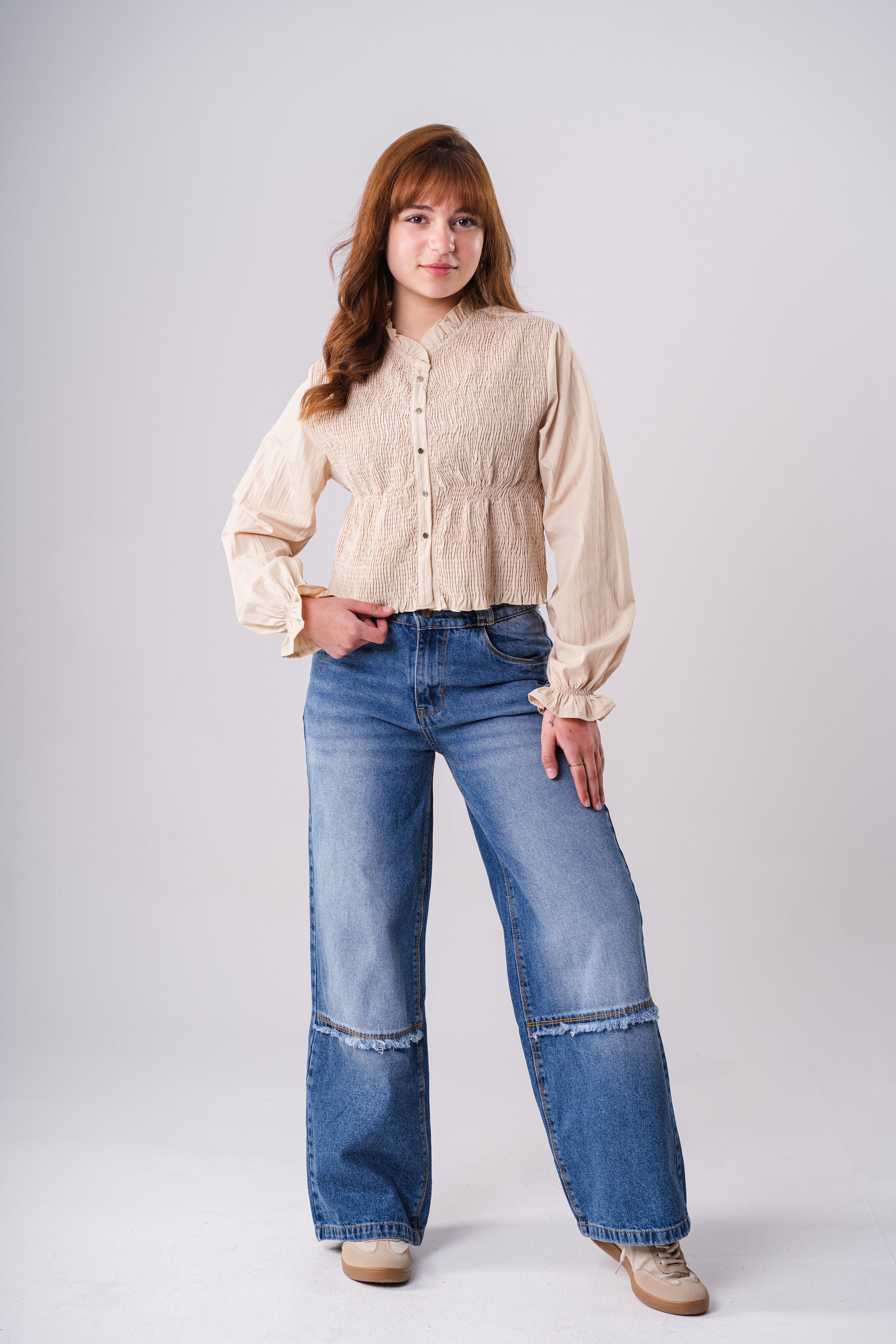 Girls Wide Leg Blue Jeans With a Bottom Cut