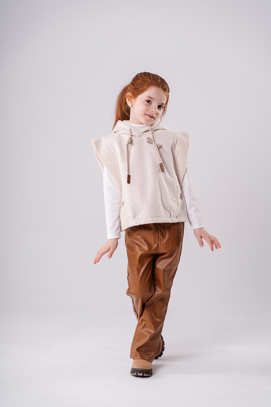 Girls Beige knitted string vest with a hood